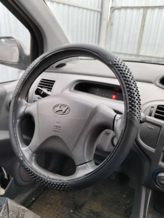 Фотография покупателя товара Оплетка на руль TORSO, кожа PU, массажные вставки, размер 38 см, черный - Фото 3