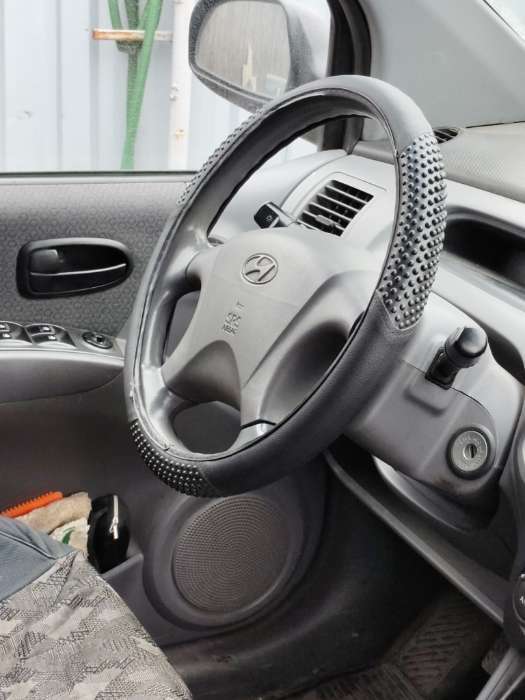 Фотография покупателя товара Оплетка на руль TORSO, кожа PU, массажные вставки, размер 38 см, черный - Фото 4