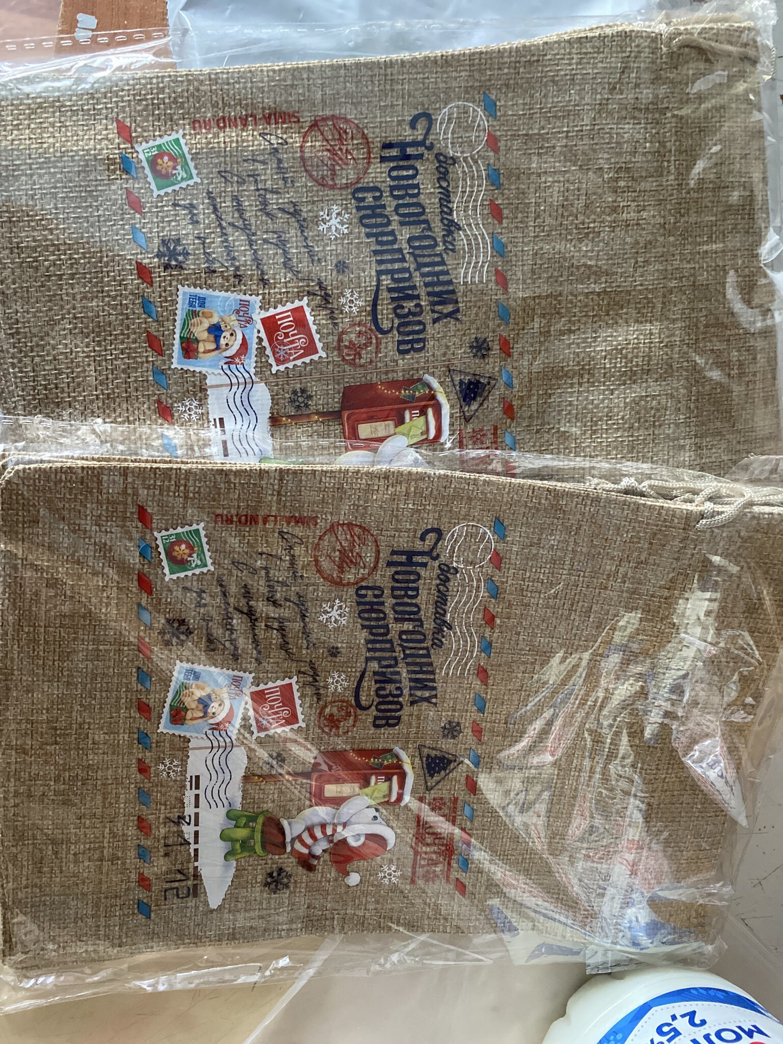 Фотография покупателя товара Мешочек новогодний подарочный с термонаклейкой «Белочка», 16×24 см ± 1.5 см - Фото 5