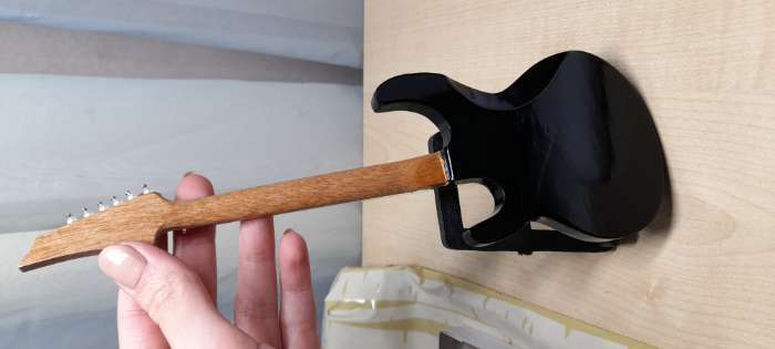 Фотография покупателя товара Гитара сувенирная Ibanez, на подставке, 24×8×2 см, чёрно-белая - Фото 5