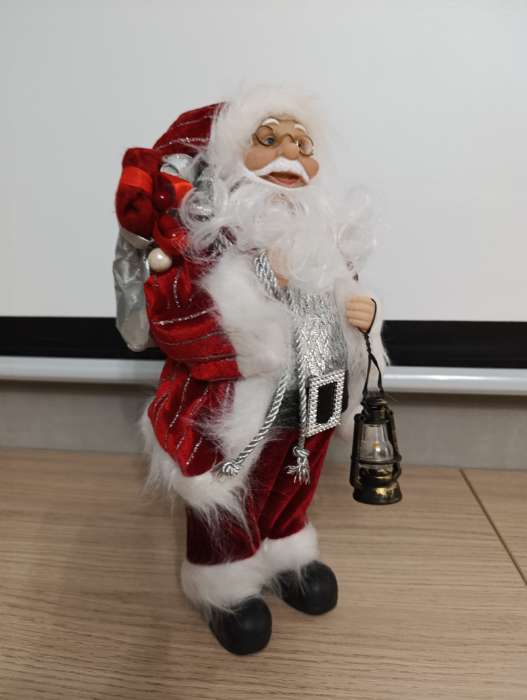 Фотография покупателя товара Дед Мороз под ёлку «Зимнее волшебство. Новогодняя игрушка в полосатой шубе, с подарками», 30 см - Фото 3