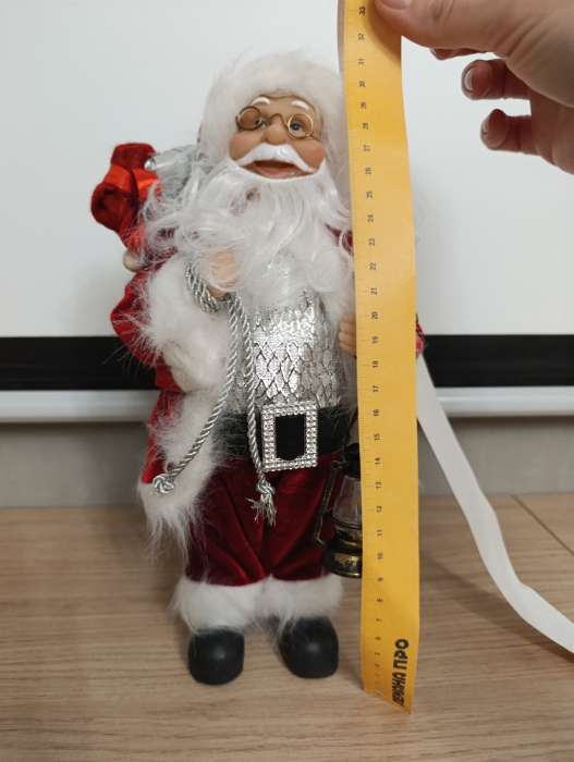 Фотография покупателя товара Дед Мороз под ёлку «Зимнее волшебство. Новогодняя игрушка в полосатой шубе, с подарками», 30 см - Фото 6