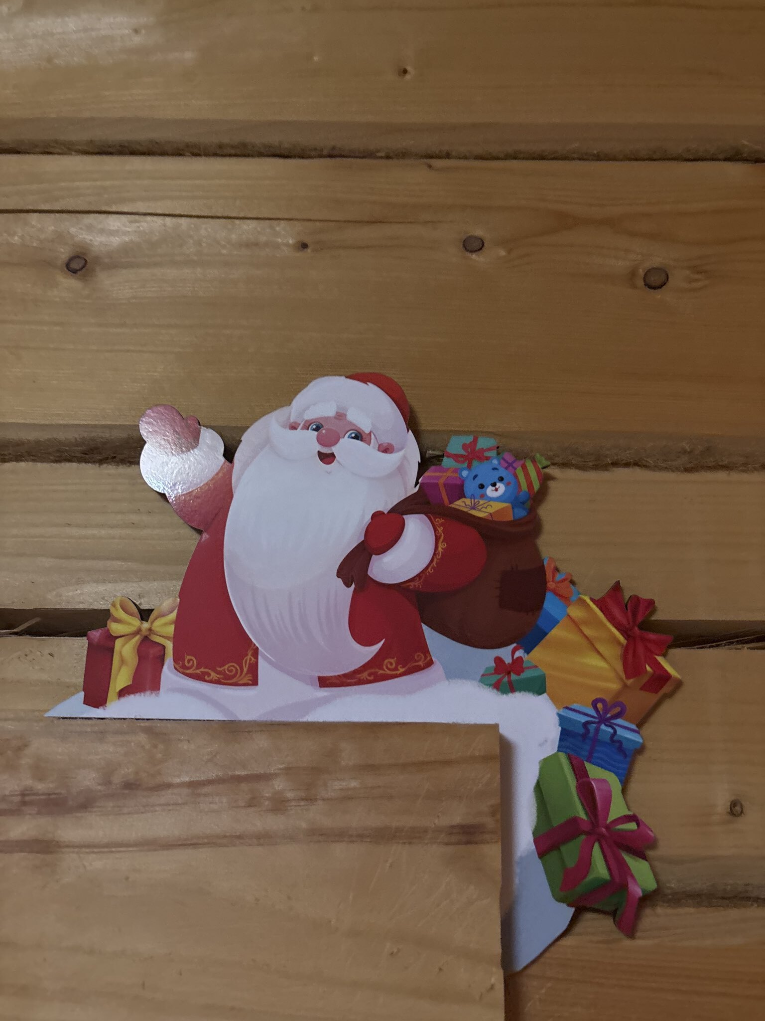 Фотография покупателя товара Новогодний декор на раму двери «Дед мороз», 23.2×20.6 см - Фото 1