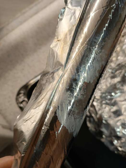 Фотография покупателя товара Фольга пищевая алюминиевая «Особо прочная», 44 см × 25 м, 14 мкм - Фото 2