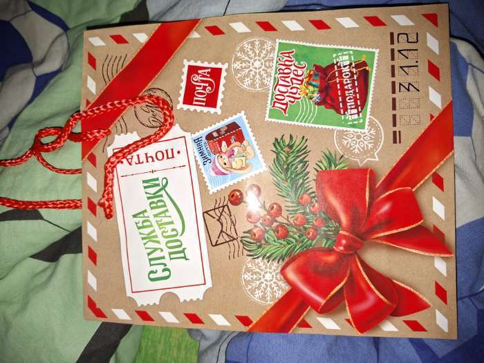 Фотография покупателя товара УЦЕНКА Пакет подарочный ламинированный новогодний «Новый год», ML 21×25×8 см, МИКС - Фото 9