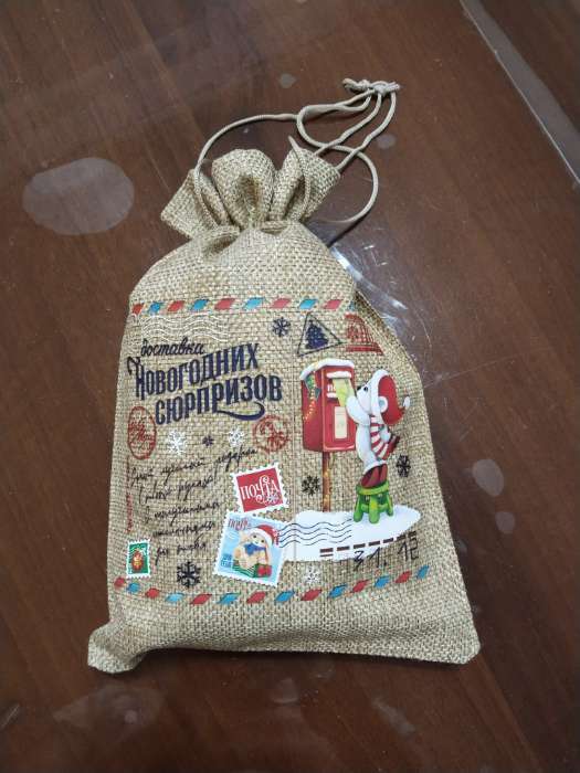 Фотография покупателя товара Мешочек новогодний подарочный с термонаклейкой «Белочка», 16×24 см ± 1.5 см - Фото 2