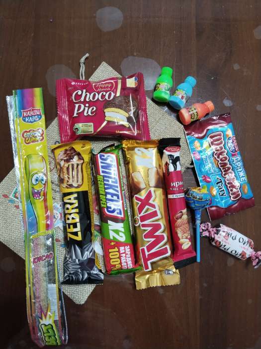 Фотография покупателя товара Мешочек новогодний подарочный с термонаклейкой «Белочка», 16×24 см ± 1.5 см - Фото 3