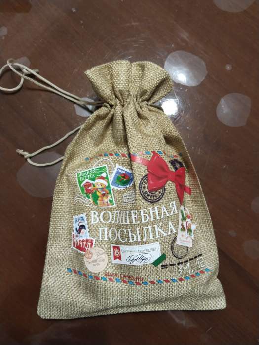 Фотография покупателя товара Мешочек новогодний подарочный с термонаклейкой «Белочка», 16×24 см ± 1.5 см - Фото 4