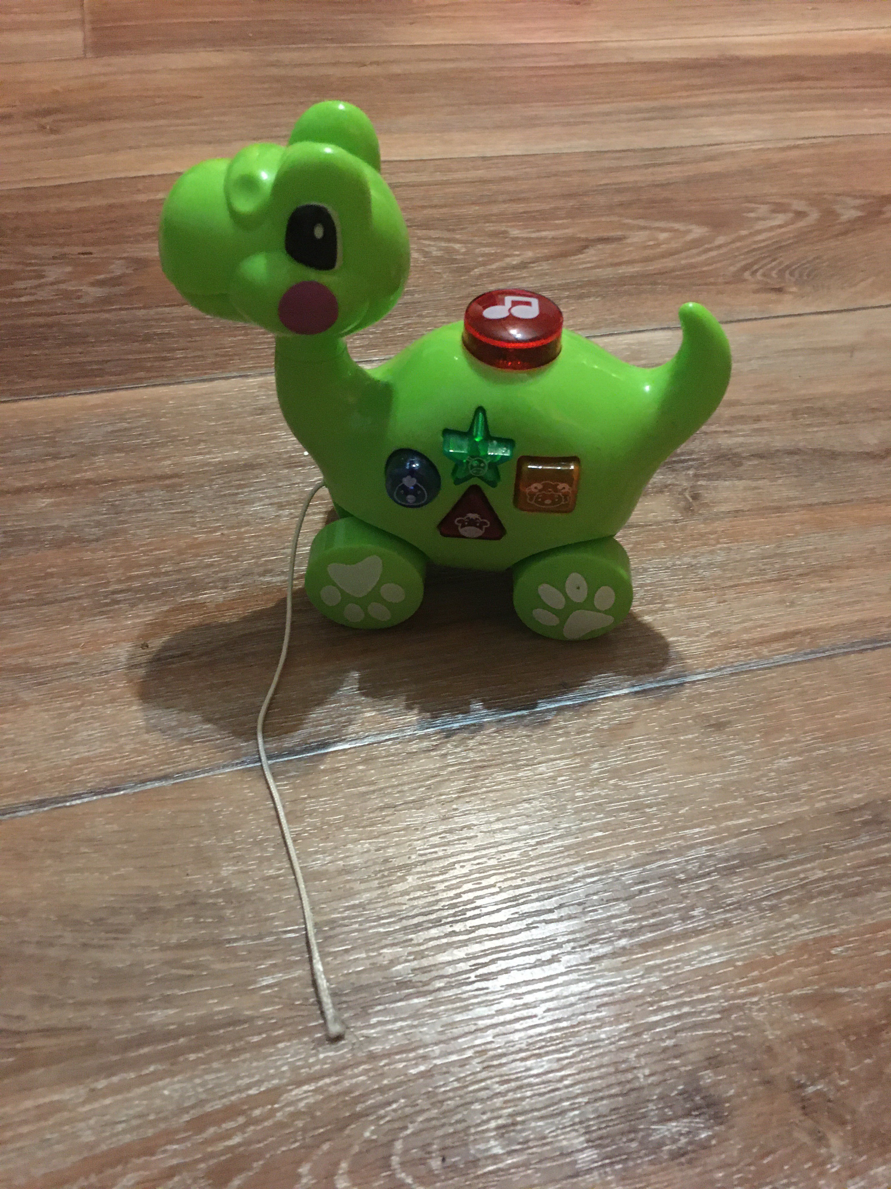 Фотография покупателя товара Музыкальная игрушка «Маленький динозаврик», звук, свет, цвета МИКС