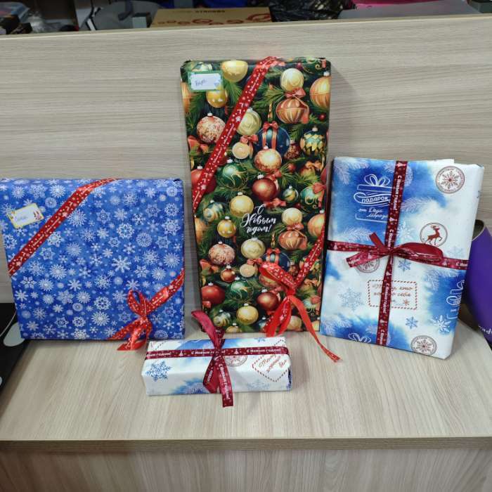 Фотография покупателя товара Упаковочная бумага на новый год «Новогоднего настроения», 50×70 см, глянцевая - Фото 2