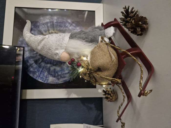 Фотография покупателя товара Интерьерная кукла текстильная свет «Гном в блестящем колпаке с мешком подарков на санках», 10×26×41 см - Фото 1