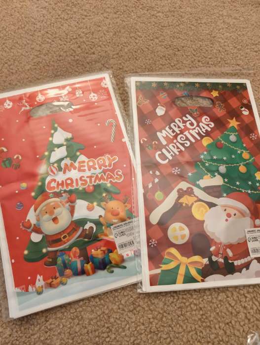 Фотография покупателя товара Пакет подарочный новогодний из жемчужной пленки, «Команда Санты», 17×25±1 см - Фото 1