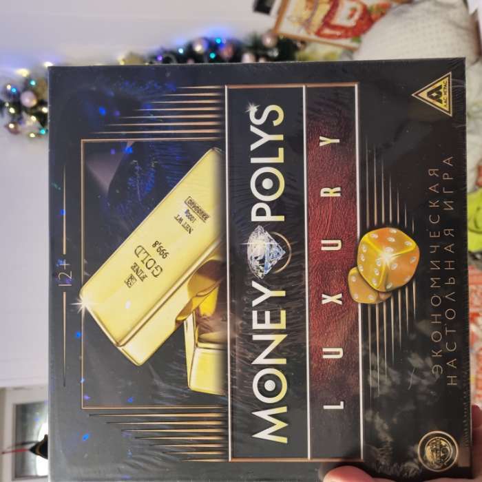 Фотография покупателя товара Новогодняя настольная игра «Новый год: MONEY POLYS. Фабрика Деда Мороза», 60 карт, 44 фигурки, 6 фишек, 2 кубика, 10+ - Фото 3