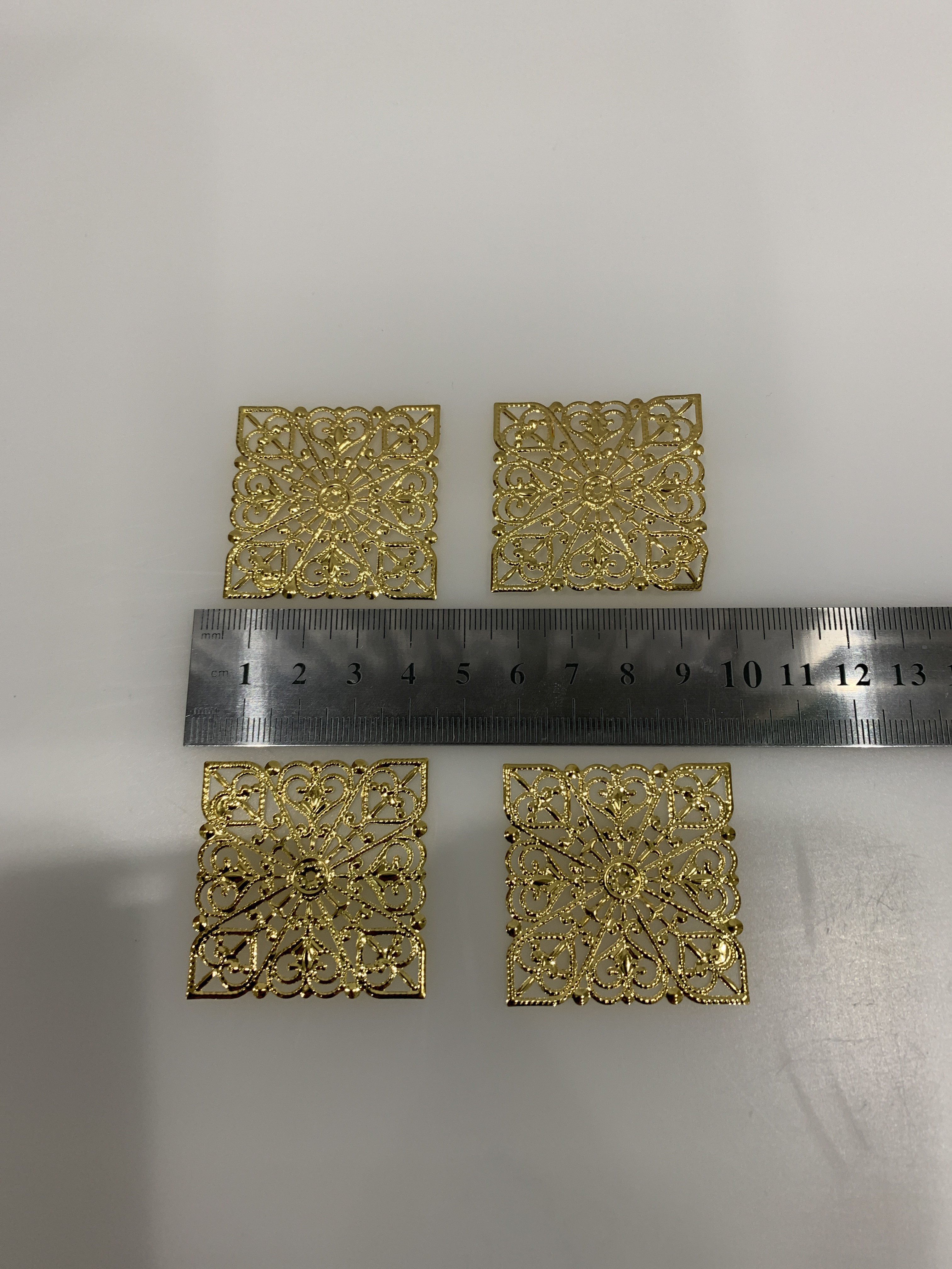 Фотография покупателя товара Декор металлический "Узоры в квадрате" набор 4 шт золото 4х4 см - Фото 3