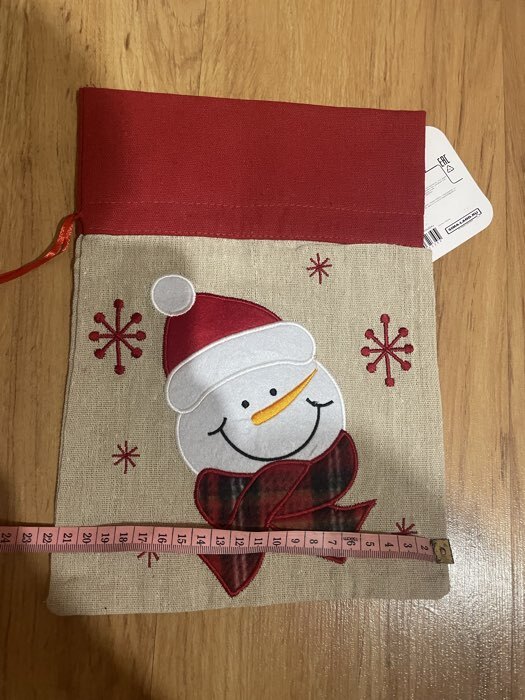 Фотография покупателя товара Мешок новогодний для подарков «Дед Мороз и снежинки», на завязках, 29×22 см - Фото 3