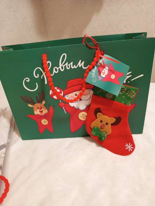 Фотография покупателя товара Пакет подарочный «Новогодний», с очками, 31×11×40 см - Фото 7