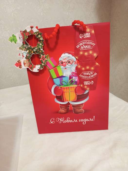 Фотография покупателя товара Пакет подарочный «Новогодний», с очками, 31×11×40 см - Фото 3