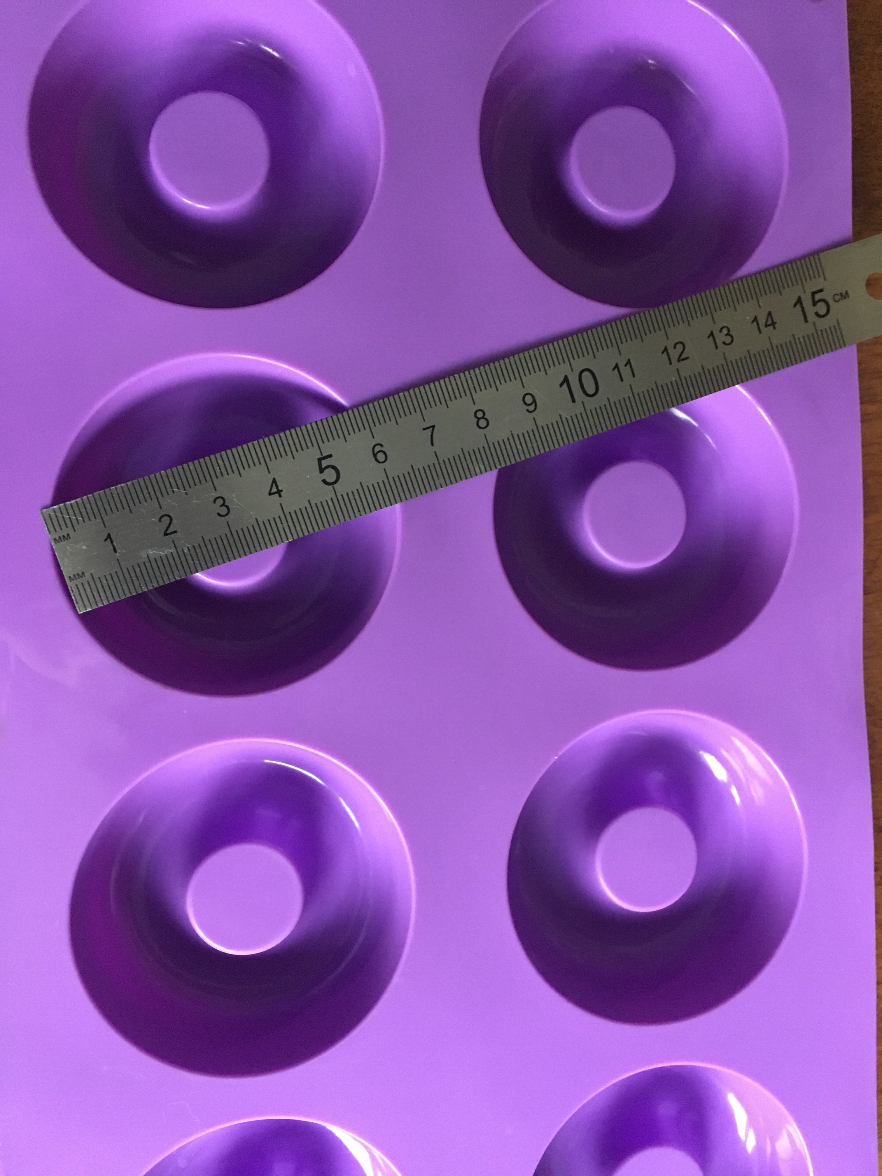 Фотография покупателя товара Форма силиконовая для выпечки Доляна «Пончики», 29×17 см, 8 ячеек, d=6 см, цвет МИКС - Фото 8