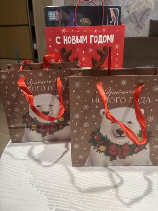 Фотография покупателя товара Пакет подарочный новогодний крафтовый квадратный «Уютного Нового года», 22×22×11 см - Фото 1