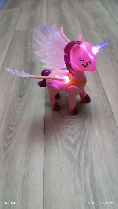 Фотография покупателя товара Музыкальная игрушка «Любимая пони» ходит, световые и звуковые эффекты, цвета МИКС - Фото 2