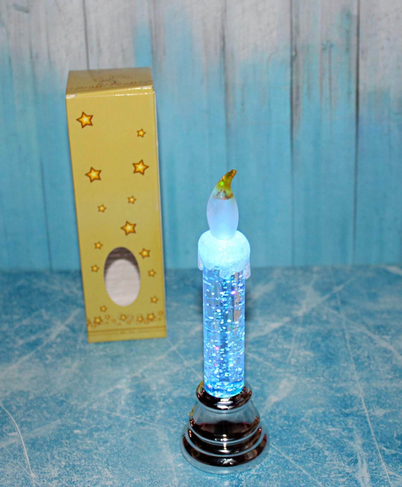 Фотография покупателя товара Светодиодная фигура «Свеча на ветру серебристая» 5 × 17 × 5 см, пластик, блёстки, батарейки AG10х3, свечение RGB