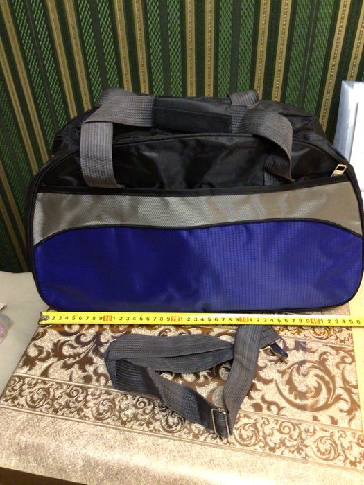 Фотография покупателя товара Сумка спортивная, отдел на молнии, наружный карман, длинный ремень, цвет чёрный/тёмно-синий - Фото 2
