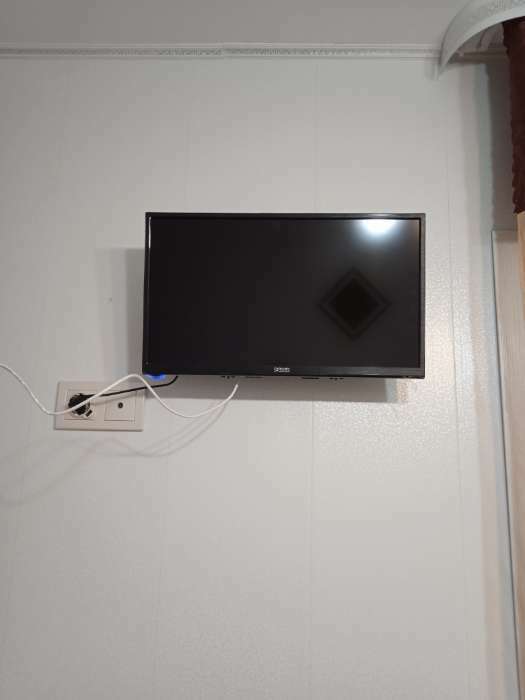 Фотография покупателя товара Кронштейн LuazON KrON-54, для ТВ, наклонный, 15-42", 55 мм от стены, черный