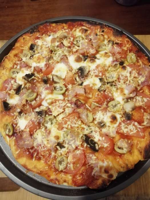 Фотография покупателя товара Форма для пиццы Доляна «Жаклин», 33×1.5 см, перфорированная, антипригарное покрытие, цвет чёрный - Фото 7