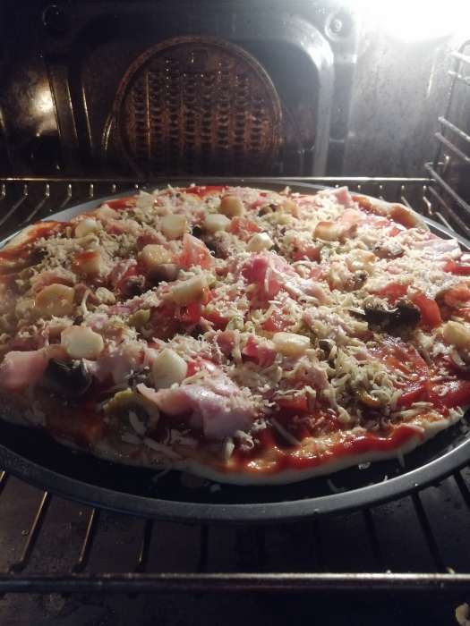 Фотография покупателя товара Форма для пиццы Доляна «Жаклин», 33×1.5 см, перфорированная, антипригарное покрытие, цвет чёрный - Фото 8