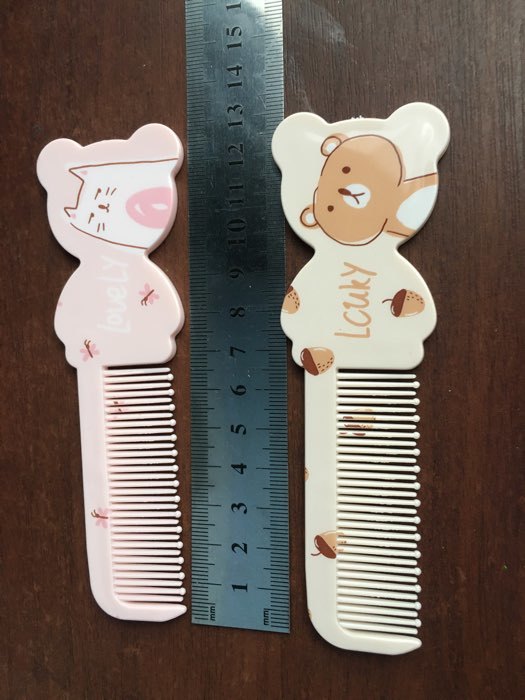 Фотография покупателя товара Расчёска фигурная «Детское счастье», 13 × 4 см, рисунок МИКС - Фото 3