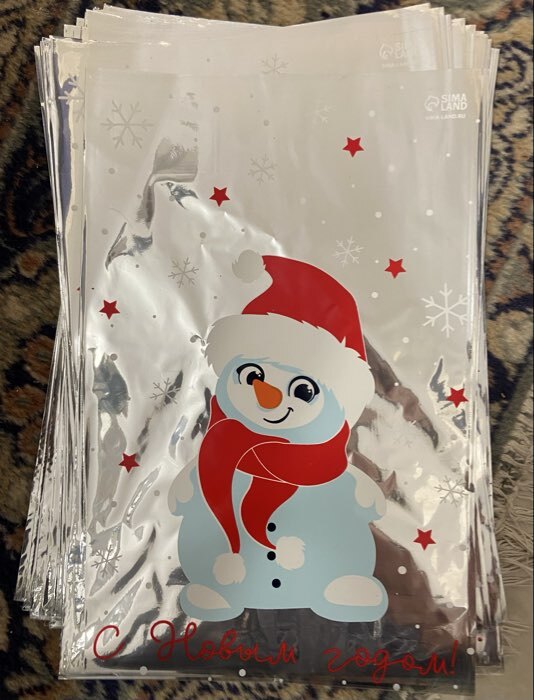 Фотография покупателя товара Пакет подарочный новогодний пластиковый «Спешу к тебе», 20×30 см - Фото 1