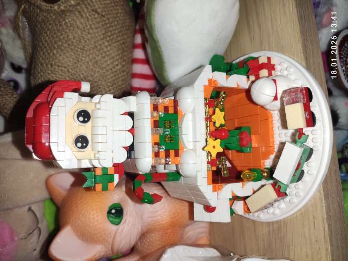 Фотография покупателя товара Конструктор из миниблоков UNICON «Новогодние истории. Дед Мороз», с гирляндой, 924 детали - Фото 8