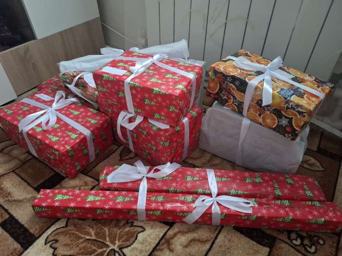 Фотография покупателя товара Бумага новогодняя упаковочная тишью «Снежинки со звездами», 50×66 см - Фото 1