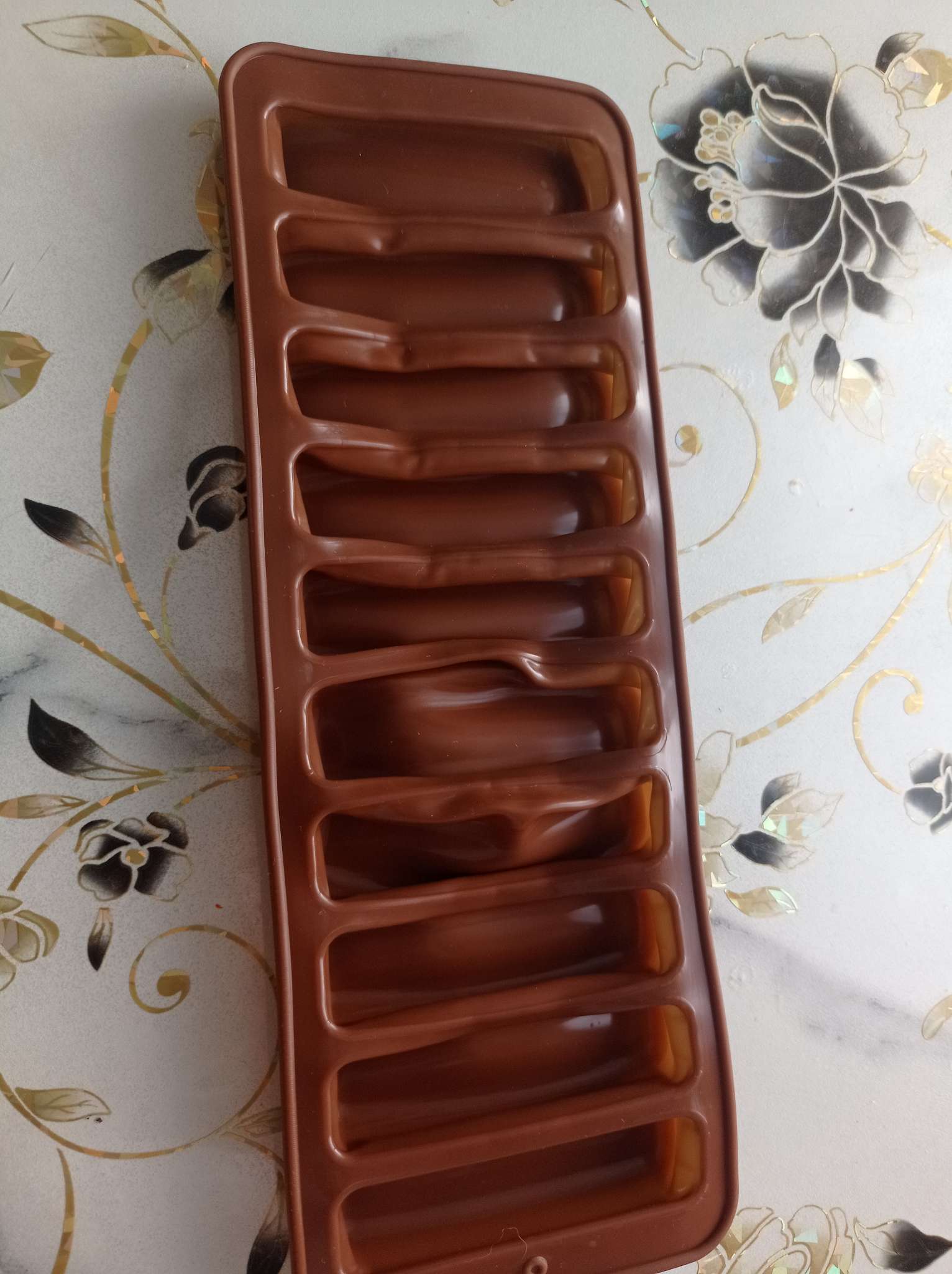 Фотография покупателя товара Форма для выпечки печенья Доляна «Савоярди», силикон, 26×9 см, 10 ячеек (7.1×1.7 см), коричневая - Фото 10