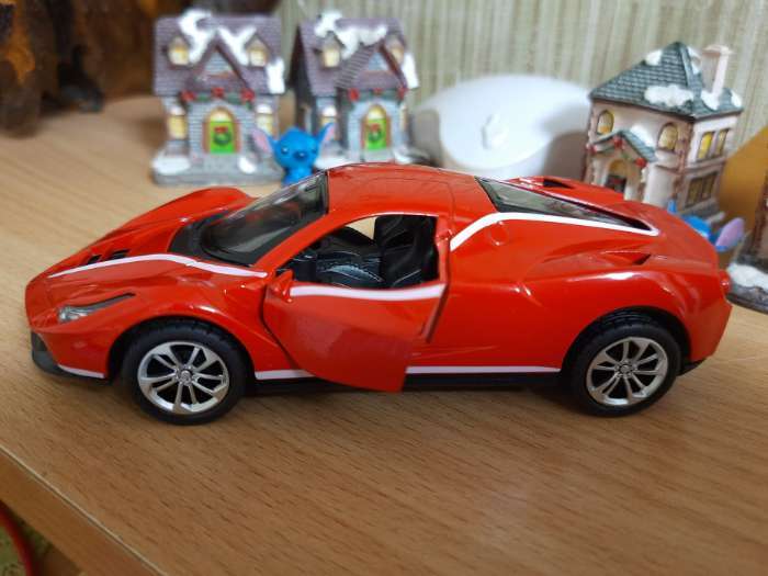 Фотография покупателя товара Машинка металлическая «Купе», 1:28, световые и звуковые эффекты, открываются двери, цвет красный - Фото 3