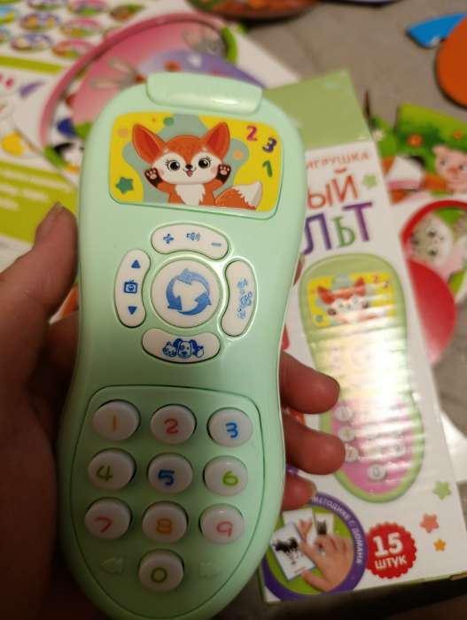 Фотография покупателя товара Обучающая игрушка «Умный пульт», световые и звуковые эффекты, зелёный - Фото 5