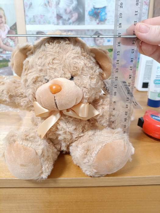 Фотография покупателя товара Мягкая игрушка «Медведь», 20 см, цвет бежевый - Фото 2