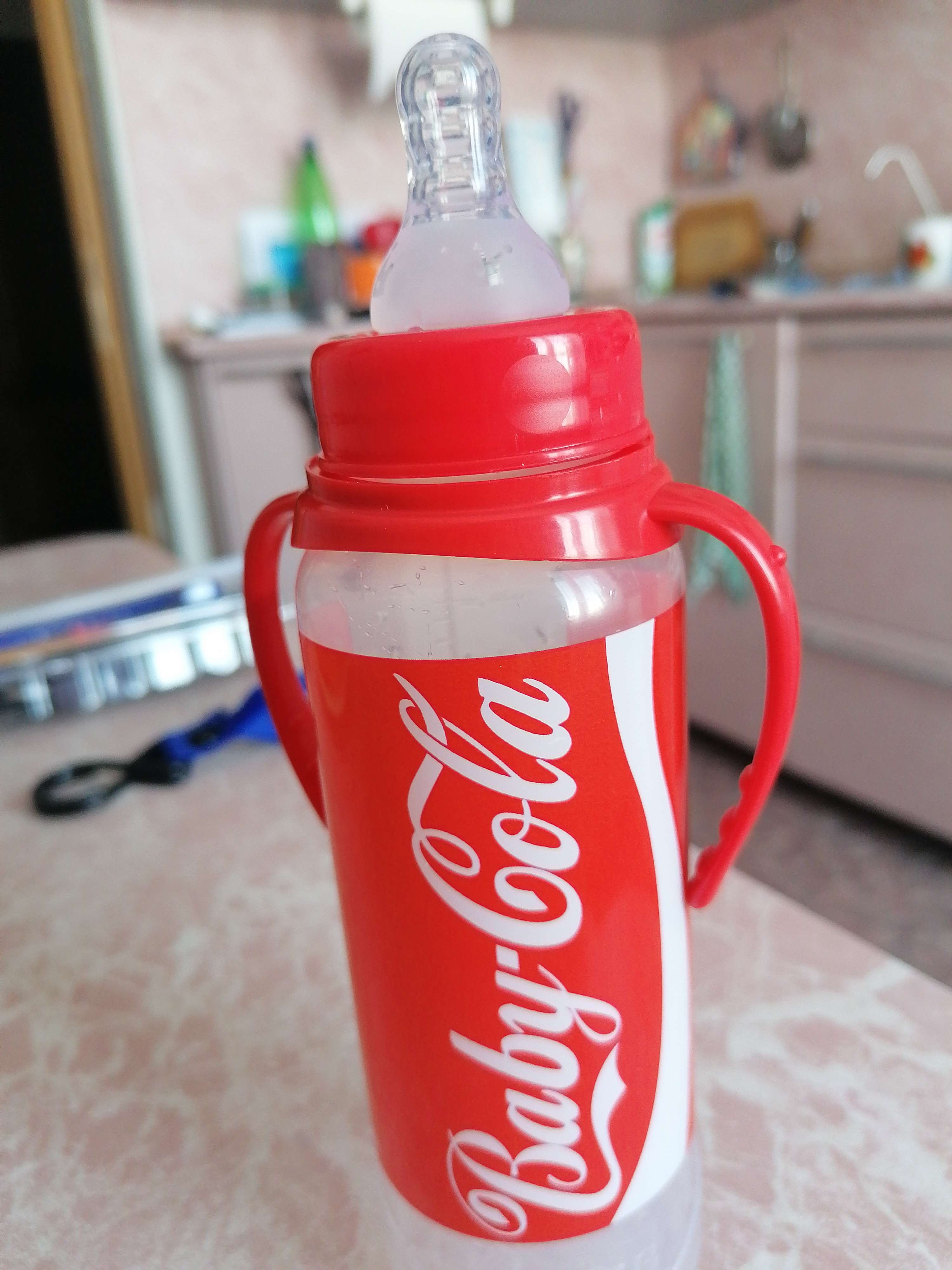 Фотография покупателя товара Бутылочка для кормления Baby Cola, 250 мл., классическое горло, от 3 мес, цилиндр, с ручками