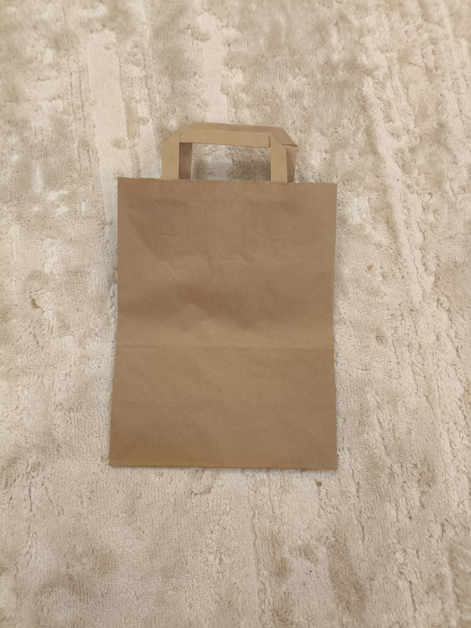 Фотография покупателя товара Пакет крафт без печати, плоская ручка 35×15×45 см - Фото 2
