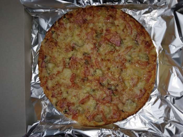 Фотография покупателя товара Форма для пиццы Доляна «Жаклин», 33×1.5 см, перфорированная, антипригарное покрытие, цвет чёрный - Фото 3