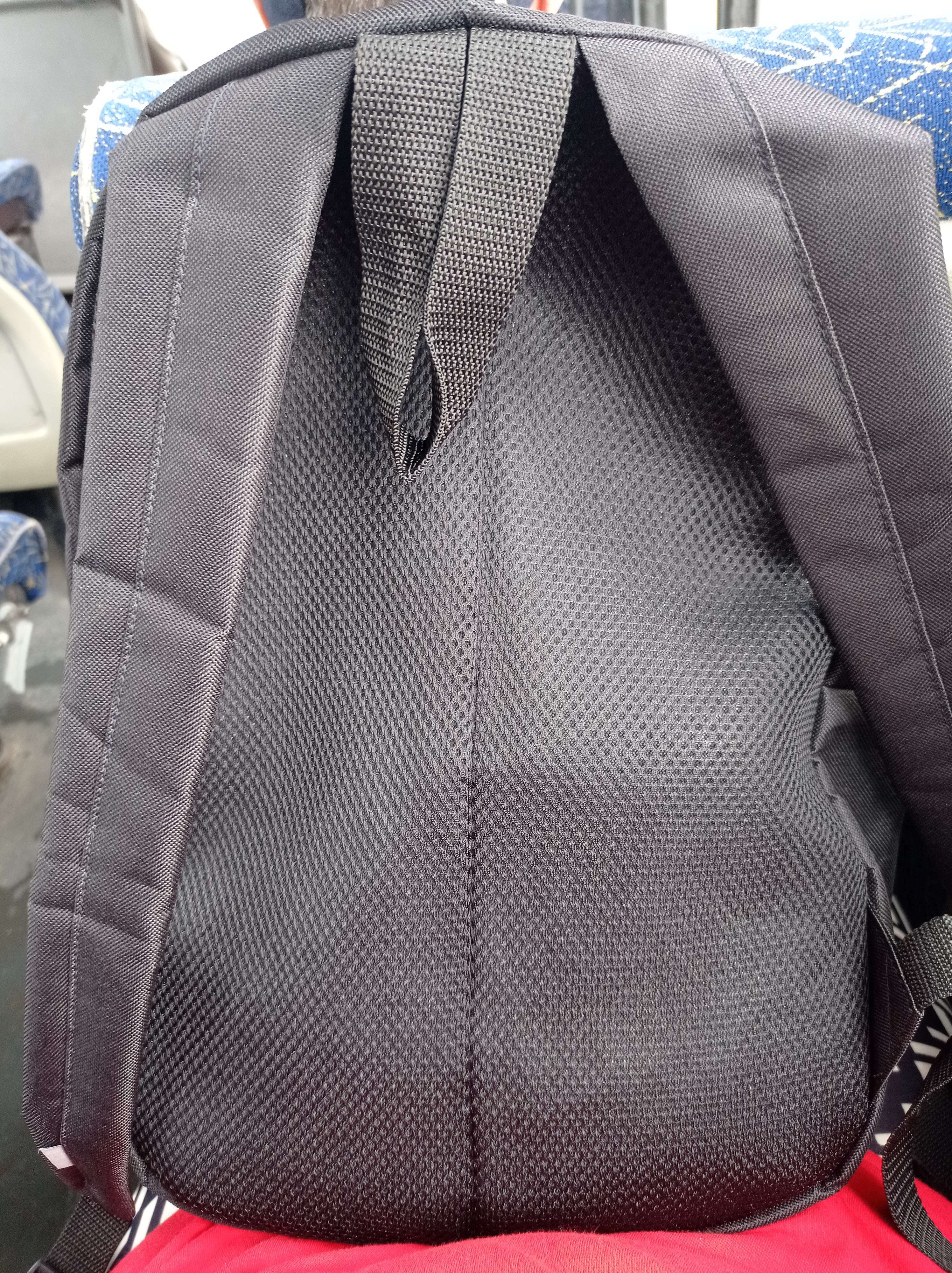 Фотография покупателя товара Рюкзак молодёжный, отдел на молнии, наружный карман, цвет чёрный/оранжевый - Фото 1