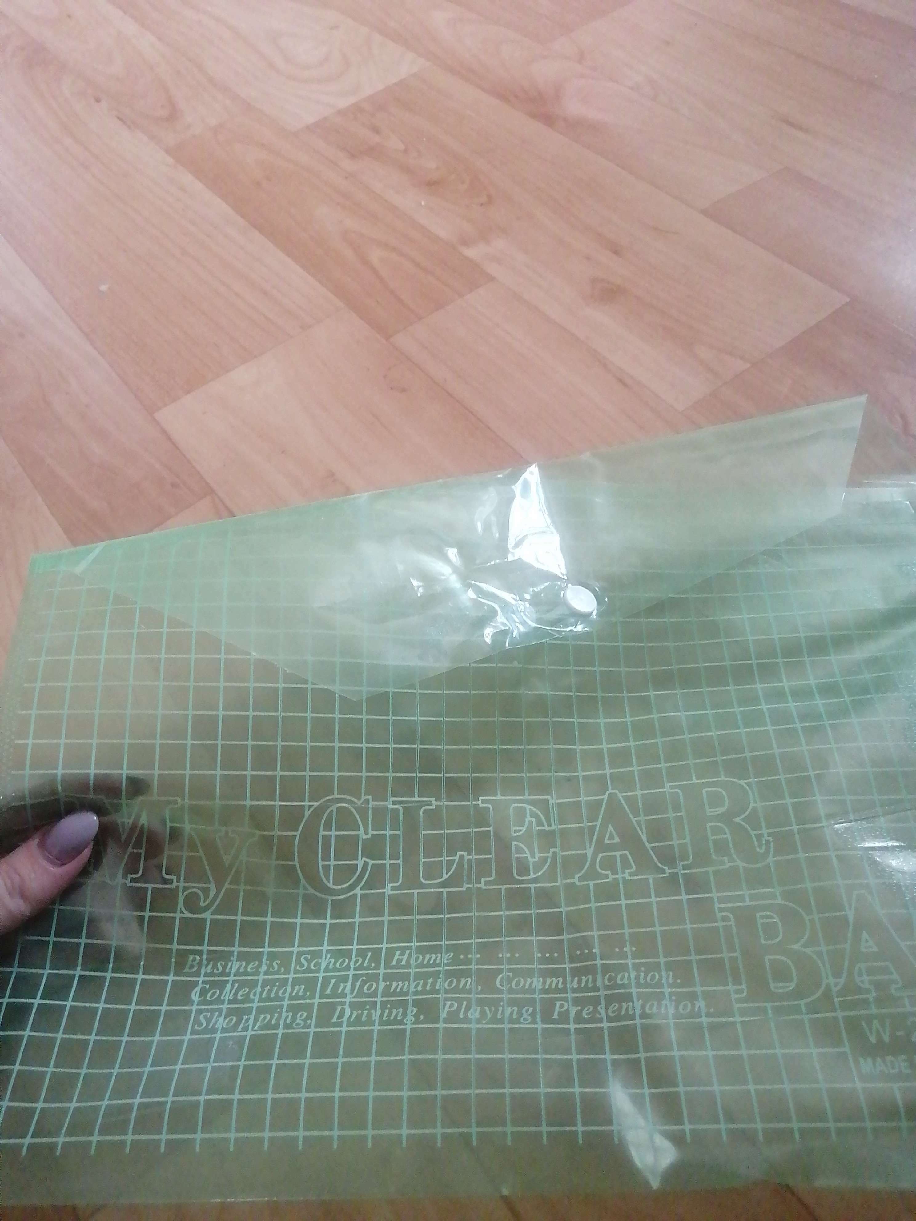Фотография покупателя товара Папка-конверт на кнопке, А4, 80 мкм, Calligrata "Клетка", тонированная, зелёная