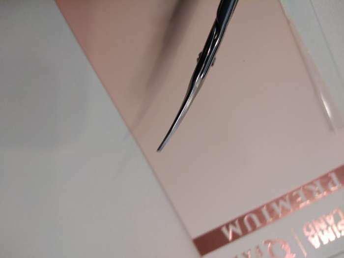 Фотография покупателя товара Ножницы маникюрные «Premium», для кутикулы, загнутые, узкие, 9,3 см, на блистере, цвет серебристый - Фото 2