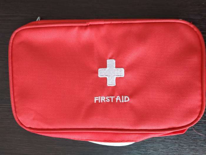 Фотография покупателя товара Аптечка дорожная First Aid, цвет красный, 24х12х6 см - Фото 1