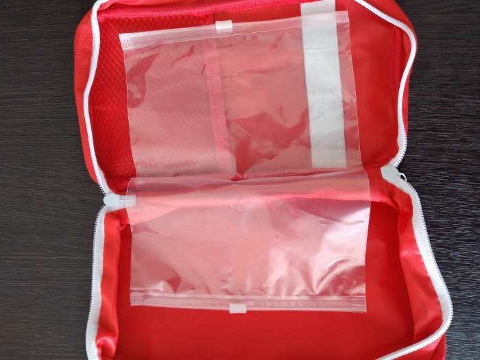 Фотография покупателя товара Аптечка дорожная First Aid, цвет красный, 24х12х6 см