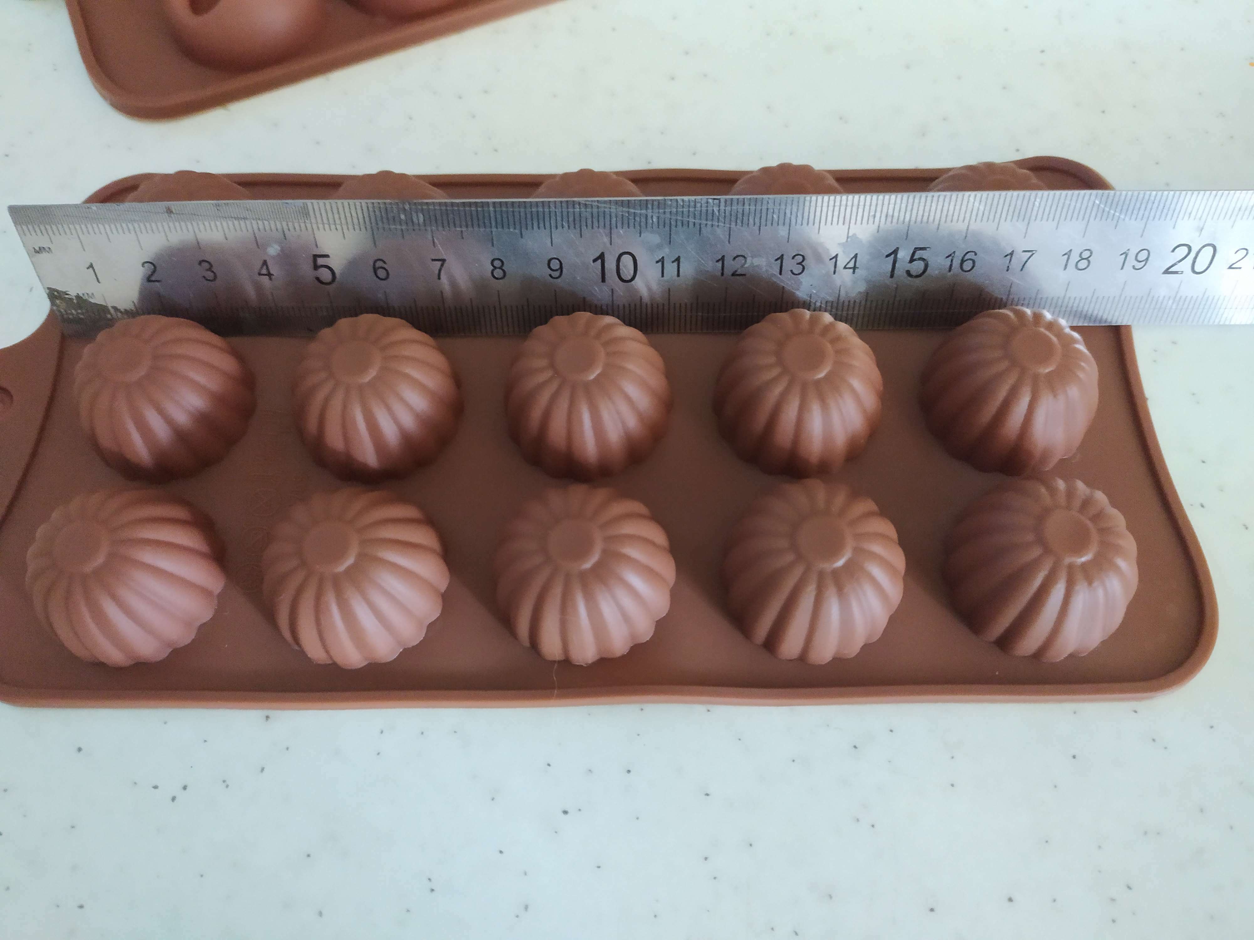 Фотография покупателя товара Форма для шоколада Доляна «Ассорти», силикон, 21,5×10,4×1,5 см, 15 ячеек, цвет коричневый - Фото 7