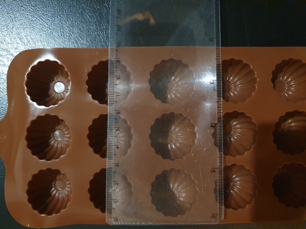 Фотография покупателя товара Форма для шоколада Доляна «Ассорти», силикон, 21,5×10,4×1,5 см, 15 ячеек, цвет коричневый