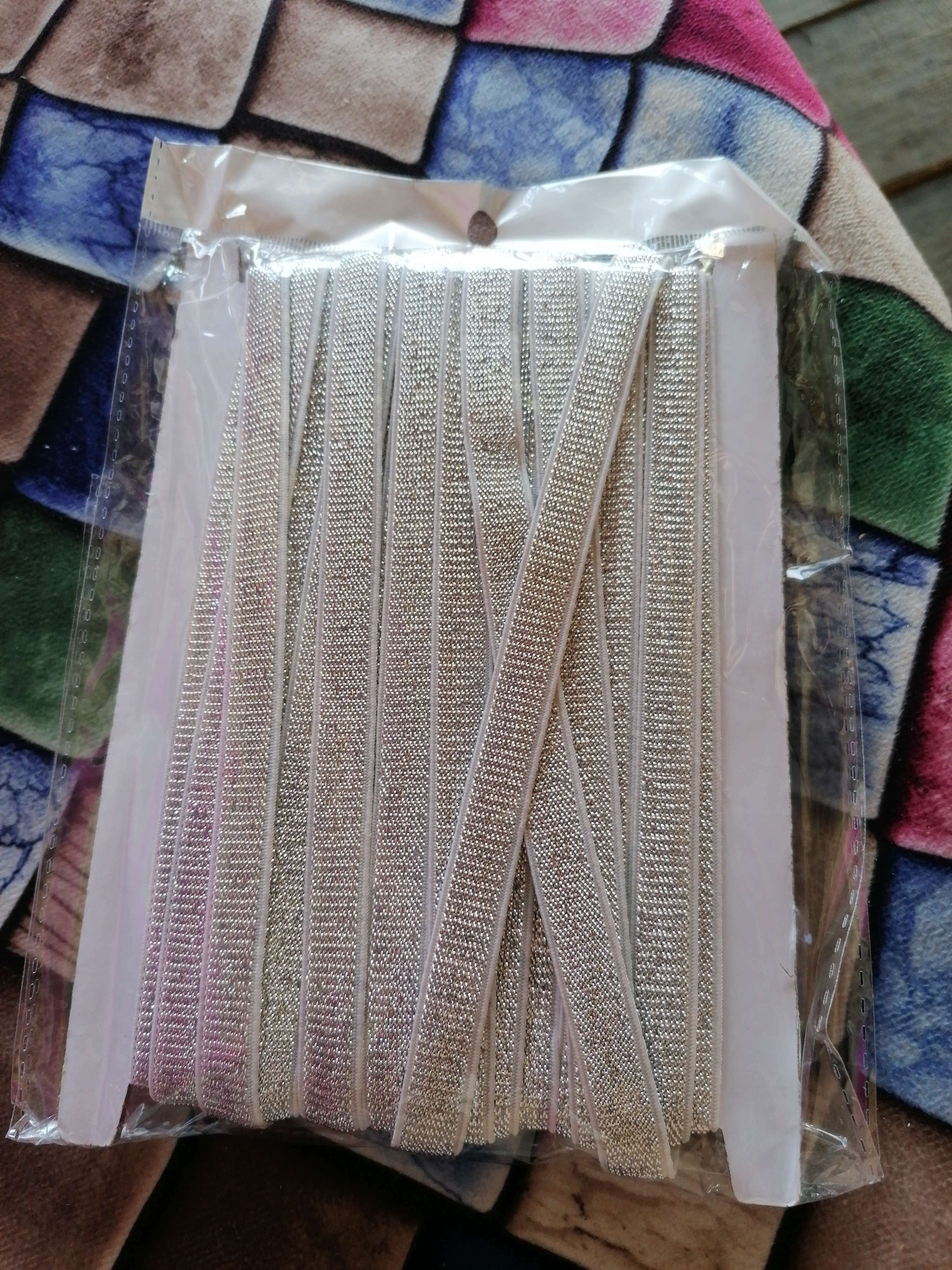 Фотография покупателя товара Резинка с глиттером, 10 мм, 10 ± 1 м, цвет белый/серебряный