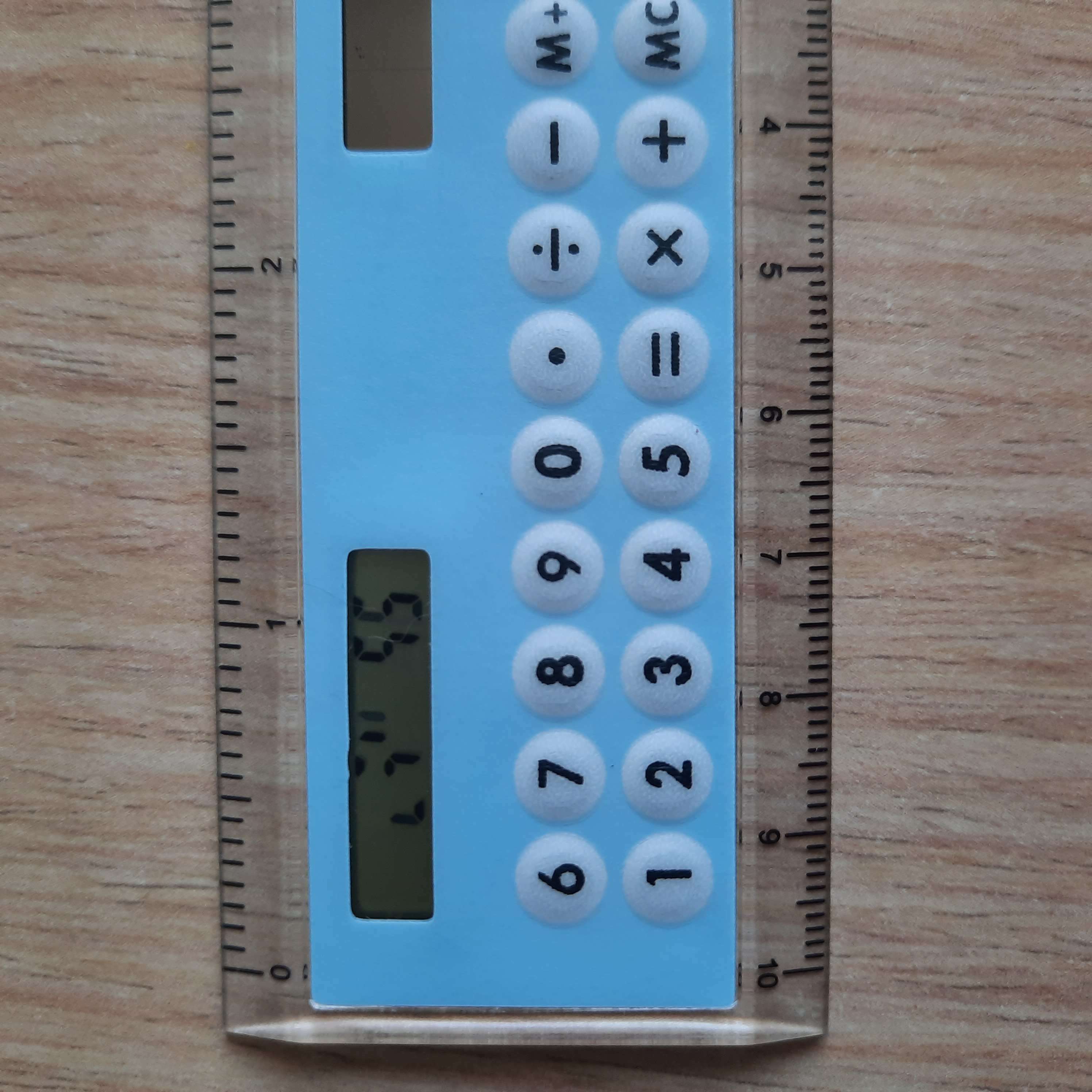 Фотография покупателя товара Калькулятор - линейка, 10 см, 8 - разрядный, корпус прозрачного цвета, с транспортиром, работает от света, МИКС
