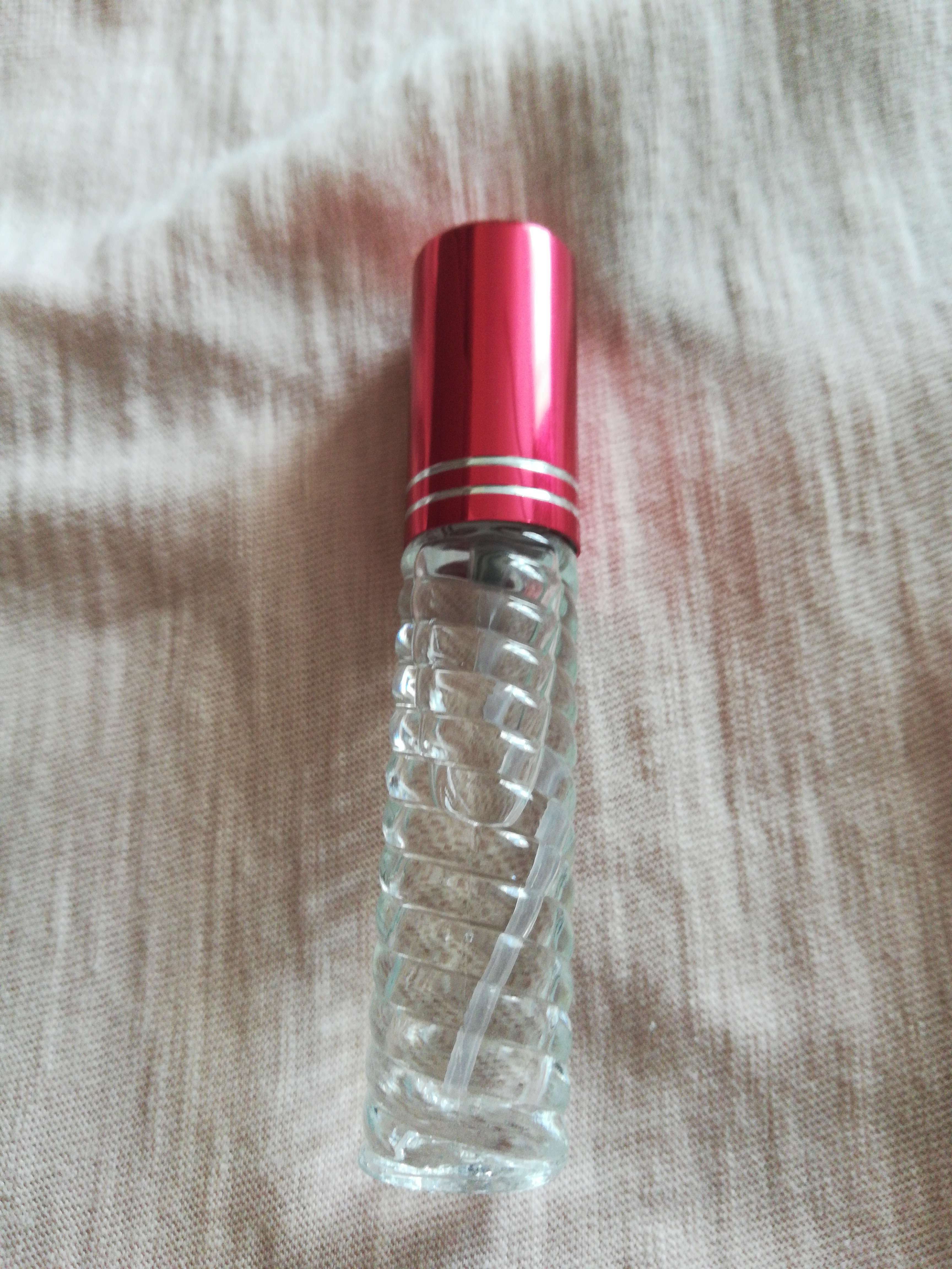 Фотография покупателя товара Флакон стеклянный для парфюма «Плетение», с распылителем, 5 мл, цвет МИКС - Фото 2